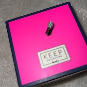 Keep collective tennis racket charm